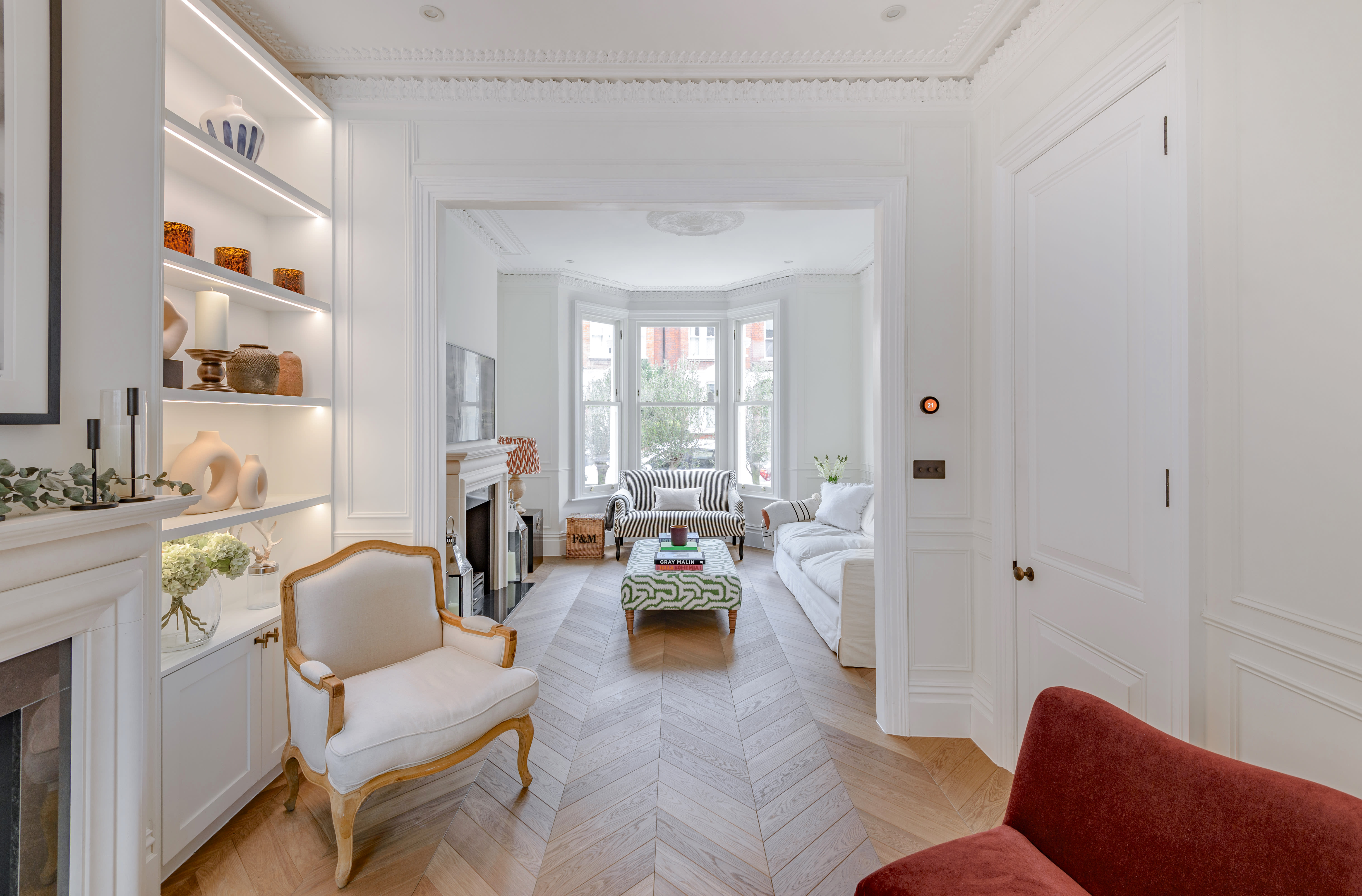 living room with chevron floor